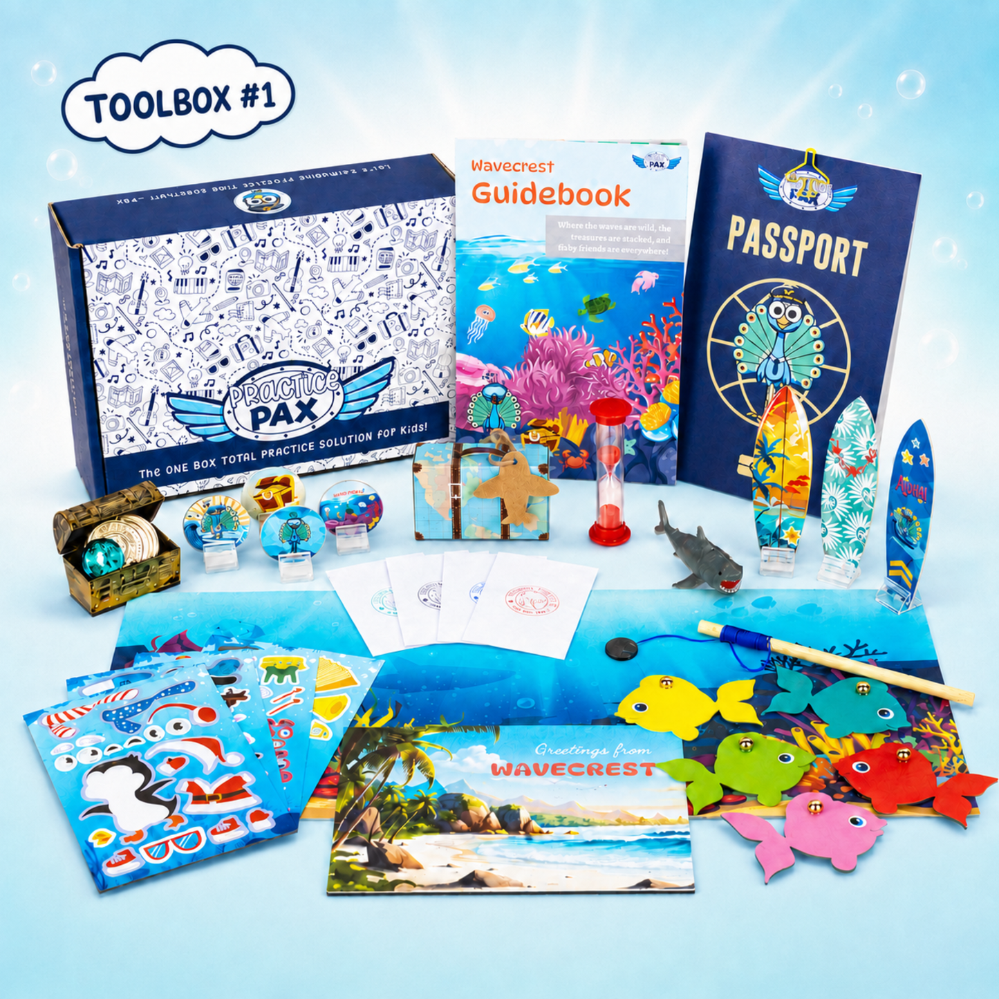 WavesCrest Music Practice 'Toolbox #1' ocean-themed activity kit with a blue box, guidebook, passport planner, parent-child habit postcard, toy shark, colorful fish cutouts, and other marine-themed accessories arranged on a light blue background.